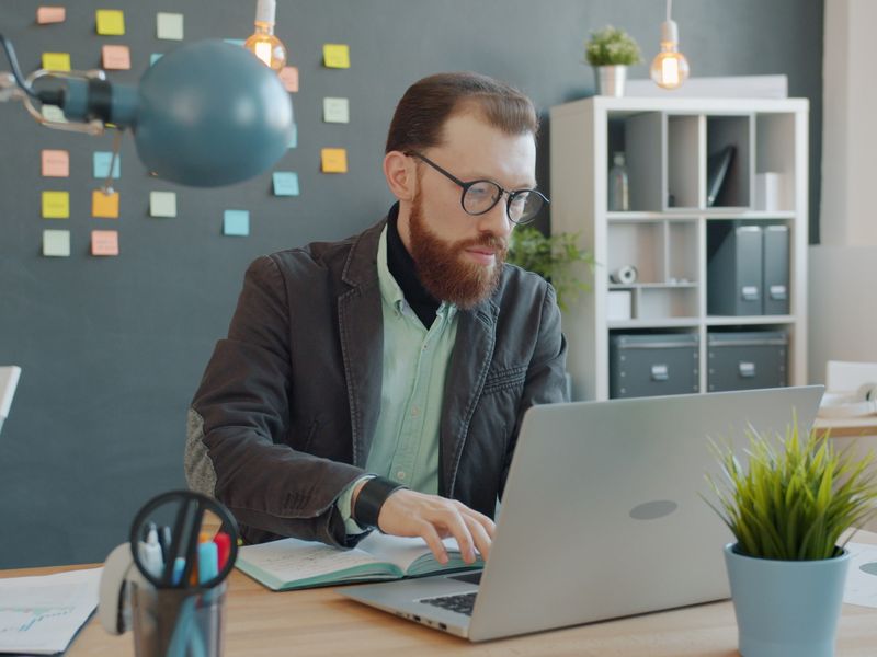 shipping manager reviewing client retention dashboard
