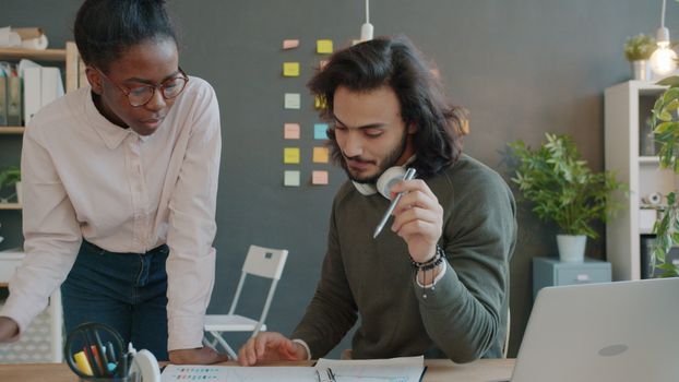 Colleagues discussing project strategy photographed by Vitaly Gariev on Pexels