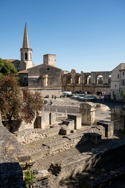 Free Scenic view of Roman ruins and St. Trophime Church in Arles, France. Stock Photo