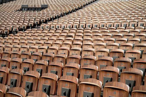 Free Wooden seats in a vast amphitheater in Avignon, Provence, showcasing patterns and symmetry. Stock Photo