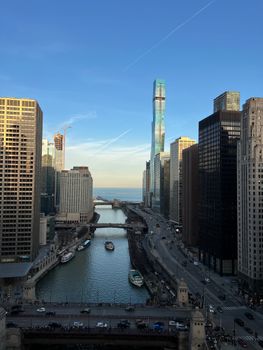 Stunning view of Chicago's iconic skyline featuring the Chicago River and modern skyscrapers.