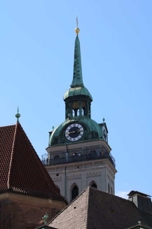 Free Photo of St. Peter's Church tower in Munich with clear blue sky. Stock Photo