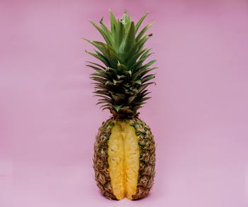 Pineapple Fruit On Pink Surface