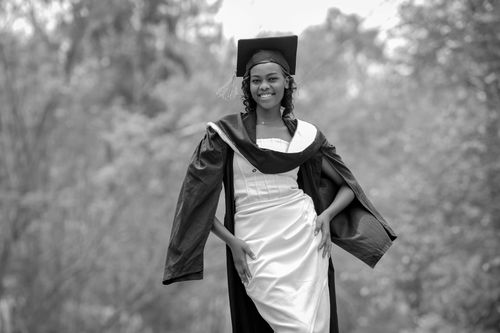 Free Black and white outdoor portrait of a young graduate in Rwanda. Stock Photo