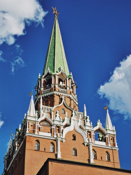 Free Stunning view of Spasskaya Tower, Moscow's iconic landmark under a clear blue sky. Stock Photo