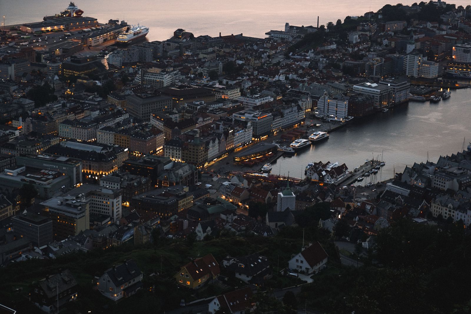 Bergen city at night from above with harbour lights