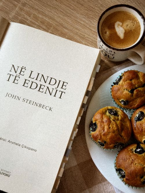 Free An inviting setup with a book, coffee, and muffins, perfect for a cozy reading session. Stock Photo