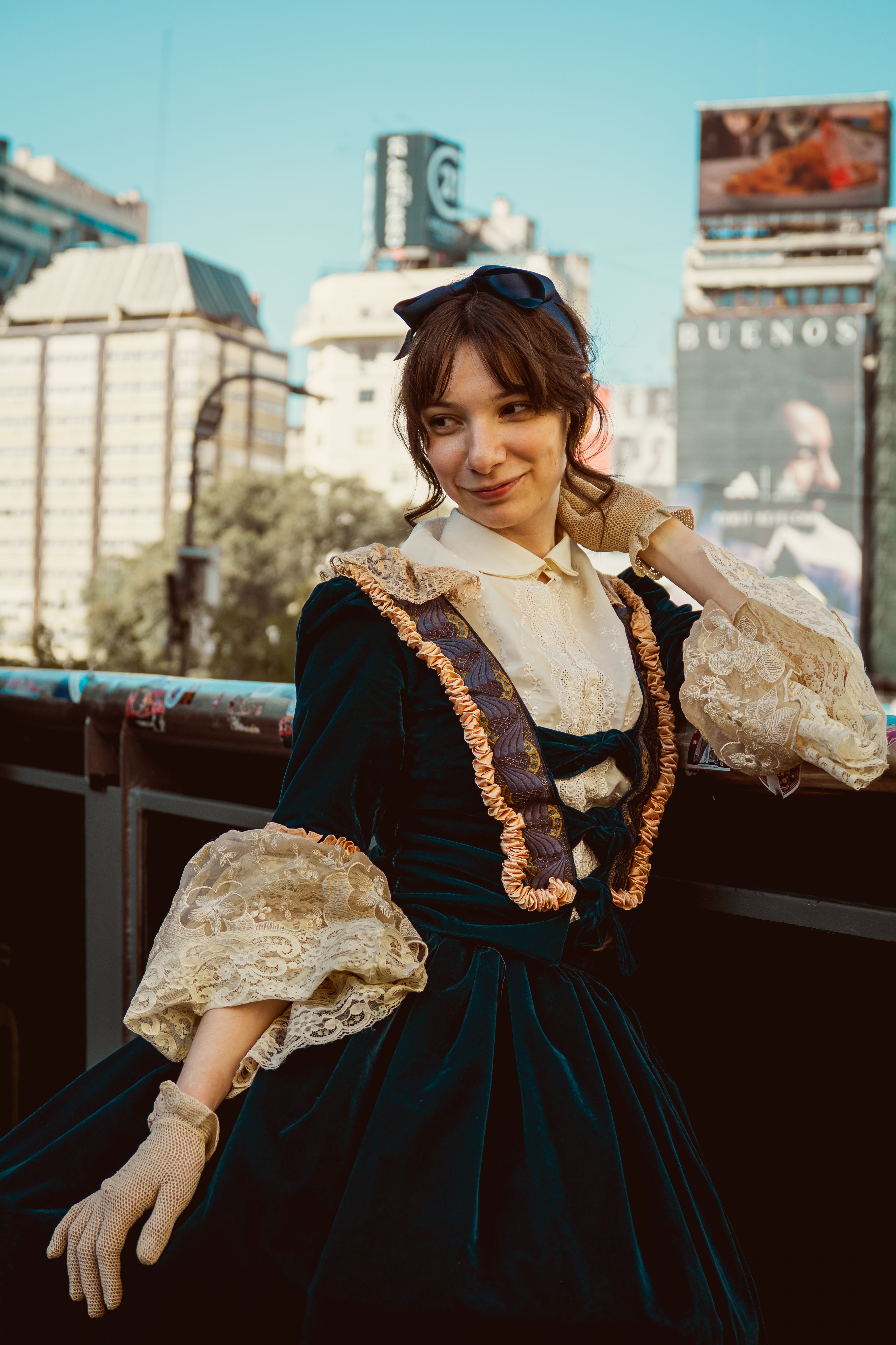 Young woman in Victorian attire posing outdoors in Buenos Aires, Argentina.