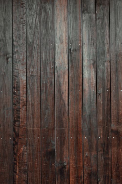 Free High-quality image of a rustic wooden wall panel with a dark, vintage style. Stock Photo