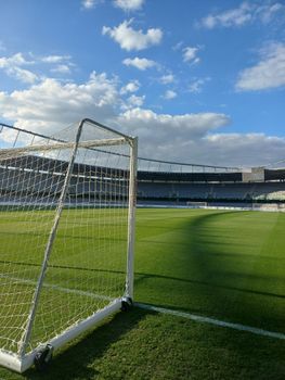 Soccer goal on a clear day at a stadium in Kaunas, Lithuania.