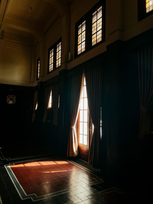 Free Sunlit interior of an elegant historical building in Jakarta, Indonesia, featuring classic architecture. Stock Photo