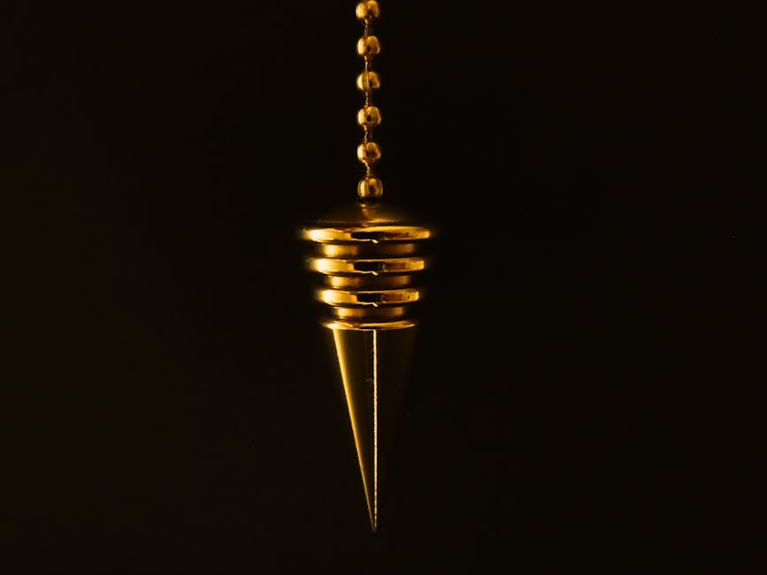 https://images.pexels.com/photos/39239/pendulum-cone-chain-gold-39239.jpeg?w=940&h=650&auto=compress&cs=tinysrgb