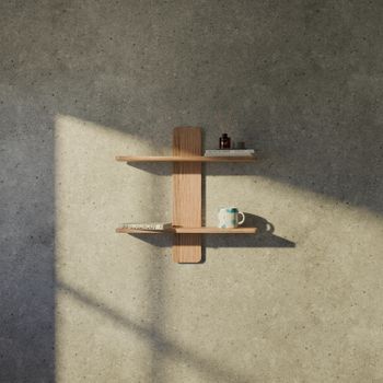 Minimalist wooden shelf with books and a mug in soft sunlight（イメージ）