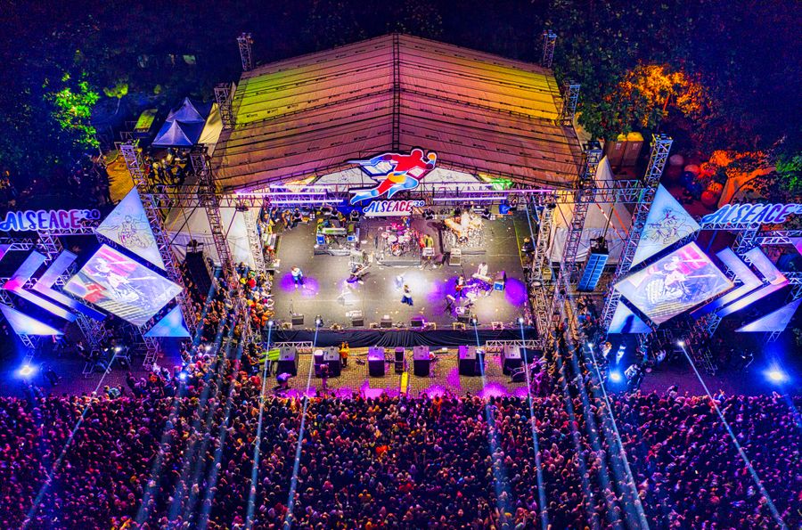 Aerial view of a live concert crowd at night