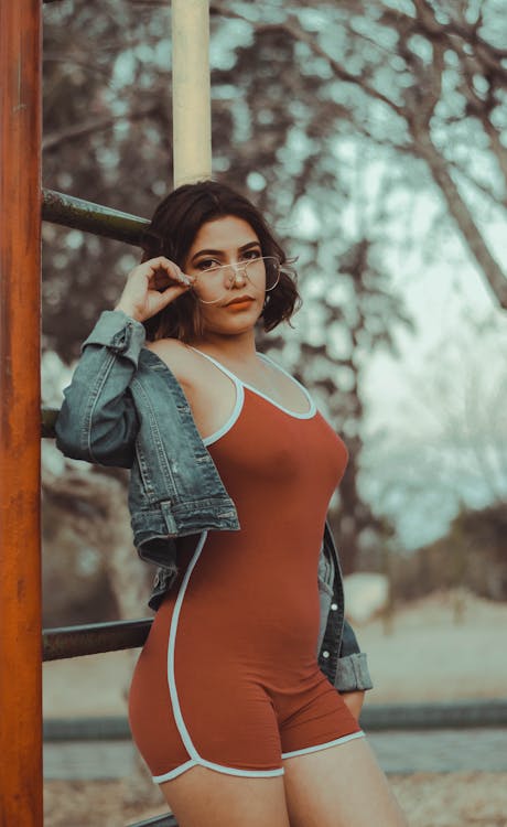 Woman Wearing Orange Romper