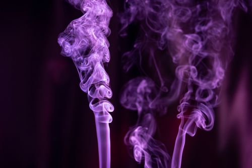 Free A captivating abstract art of swirling violet smoke against a dark backdrop. Stock Photo