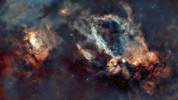 A captivating deep-space image of vibrant nebula and star cluster.