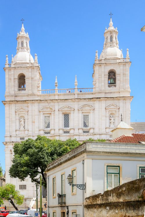 Free Stunning view of São Vicente de Fora against a clear blue sky in sunny Lisbon. Stock Photo