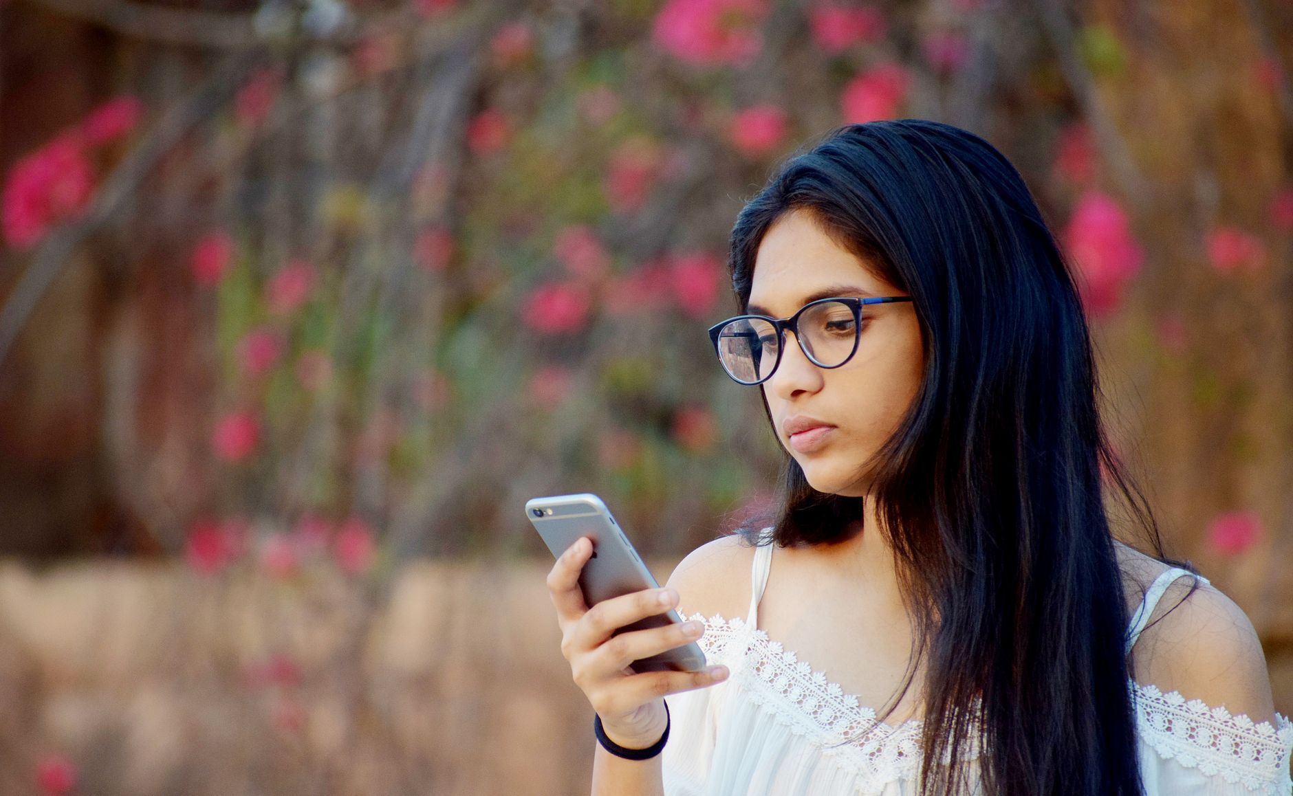 Indian woman using smartphone WhatsApp shopping