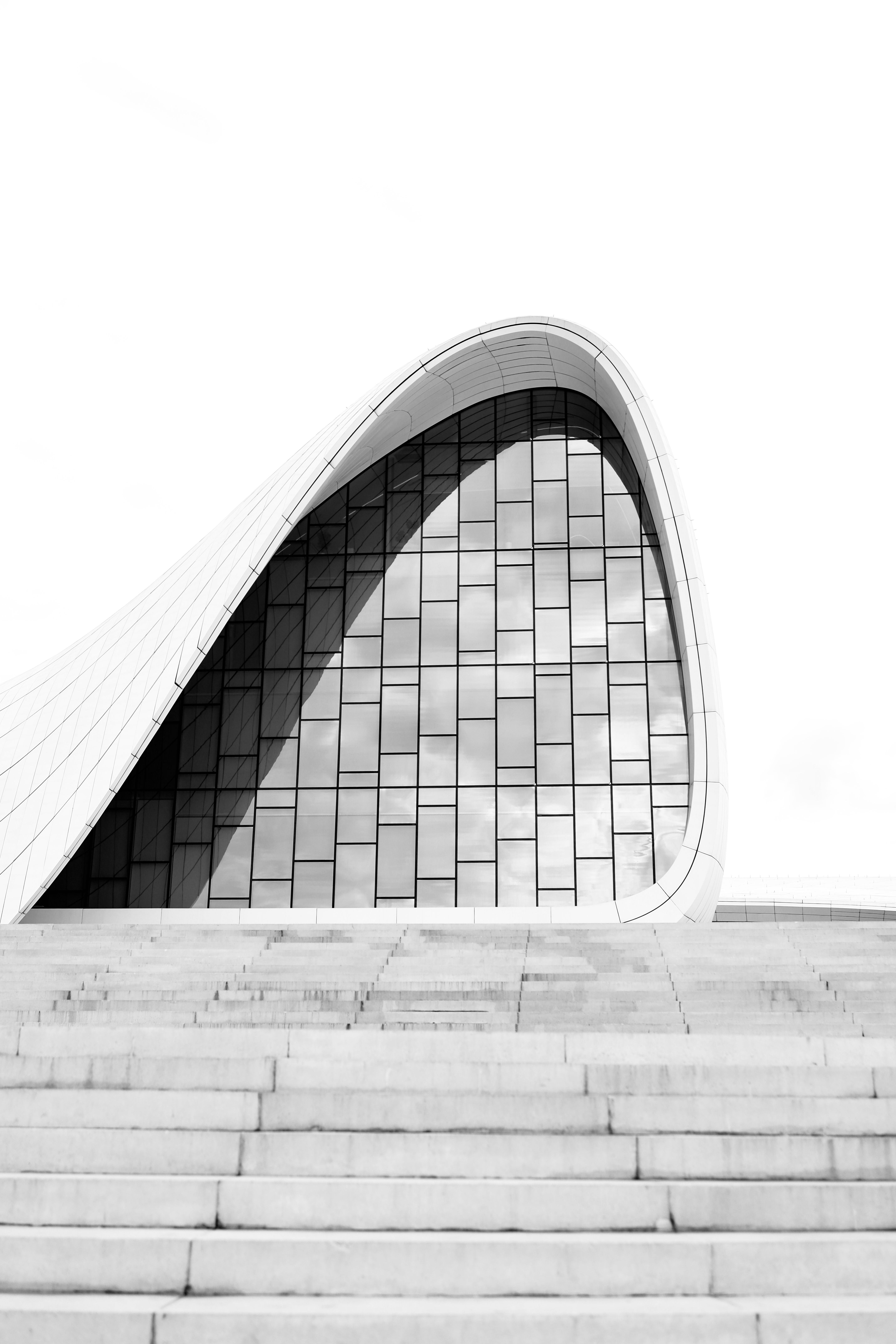 Modern architectural design of the Heydar Aliyev Center in Baku, showcasing curved silhouettes.