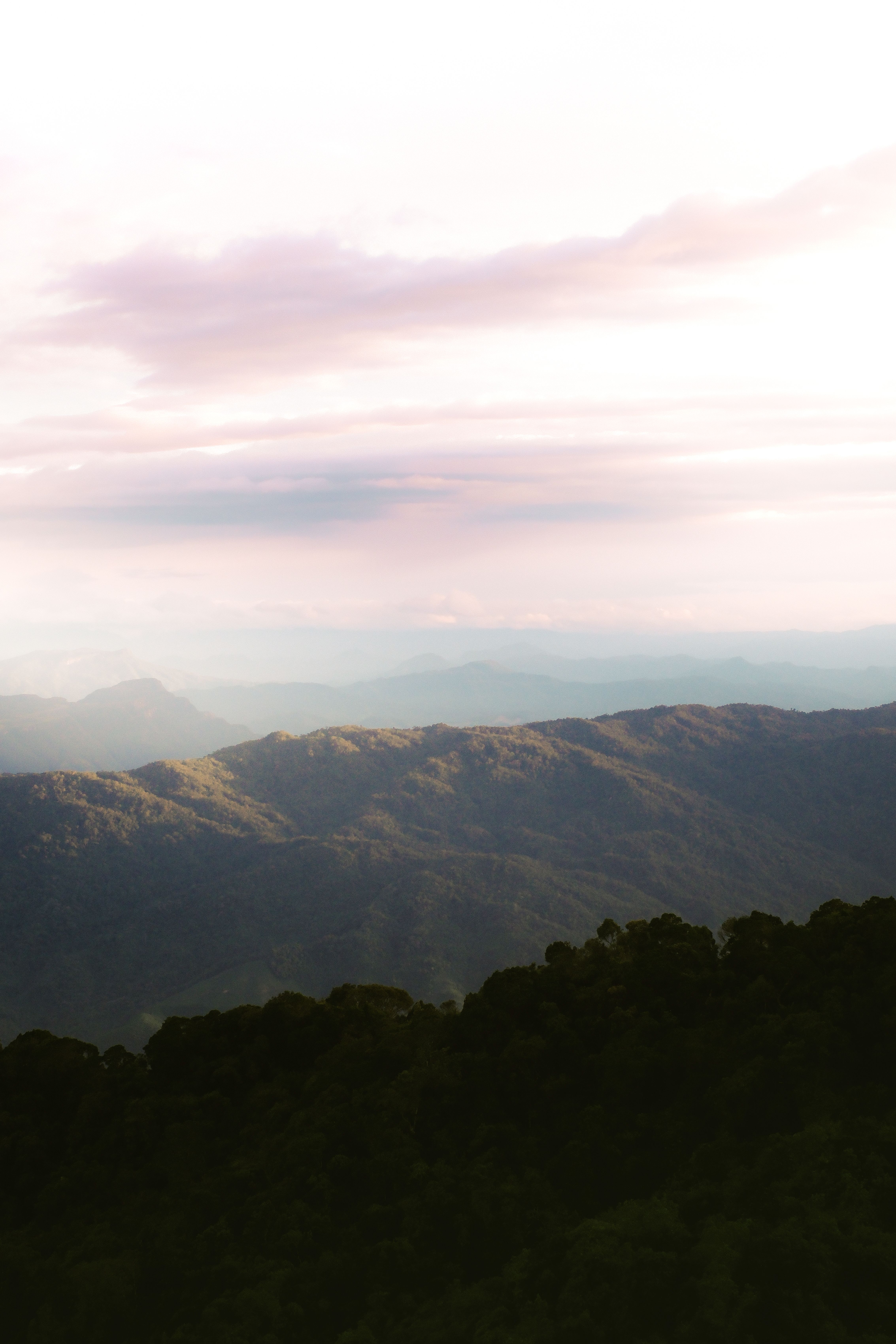 Misty mountain landscape at dawn, photographed by DUYTRG TRUONG on Pexels
