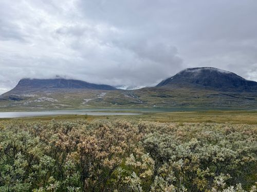Free Majestic Swedish mountains with cloudy skies over a serene landscape. Ideal for nature lovers. Stock Photo