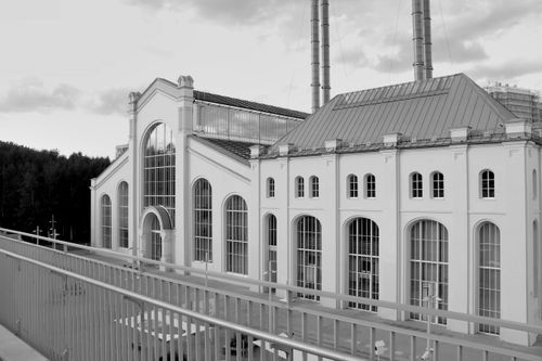 Free Black and white photo of the historic GES-2 power station in Moscow, showcasing industrial architecture. Stock Photo