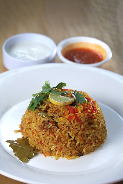 Cooked Rice On White Ceramic Plate