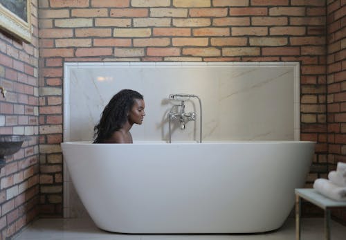 Woman In A Tub
