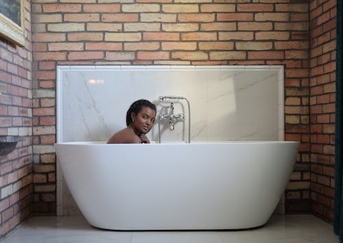 Free Woman In A Bathtub  Stock Photo