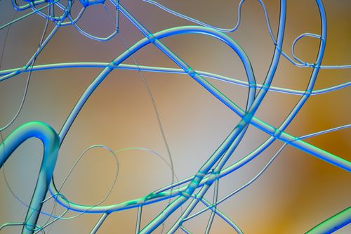 Free Vibrant abstract image featuring dynamic multicolored lines and curves with a fluid design. Stock Photo
