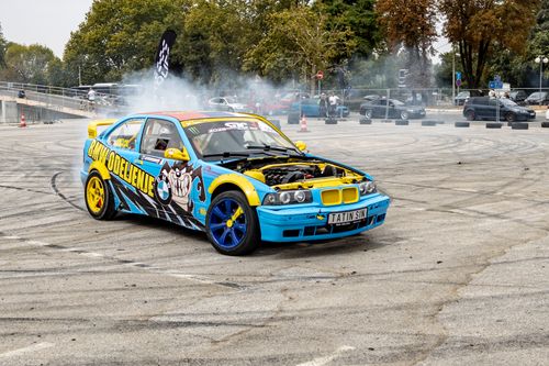 Free A vibrant drift car performing stunts outdoors in Belgrade, Serbia. Stock Photo