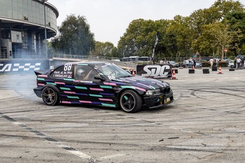 Free Dynamic shot of a car drifting during a motorsport event in Beograd, Serbia. Stock Photo