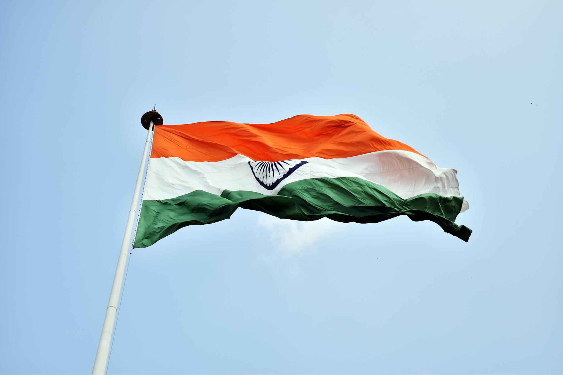 Green White and Orange Flag on the Pol