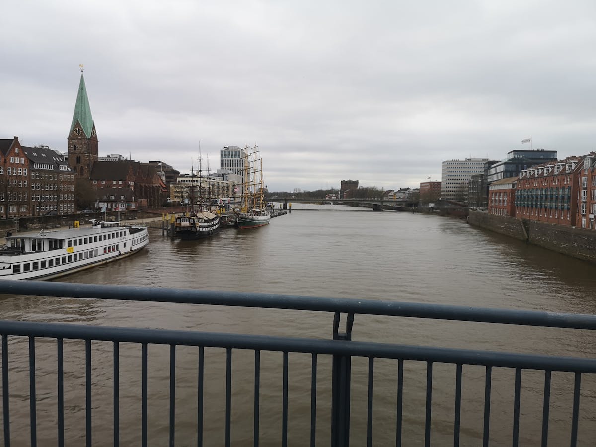Styled console table with lamp, books, and decorative objects