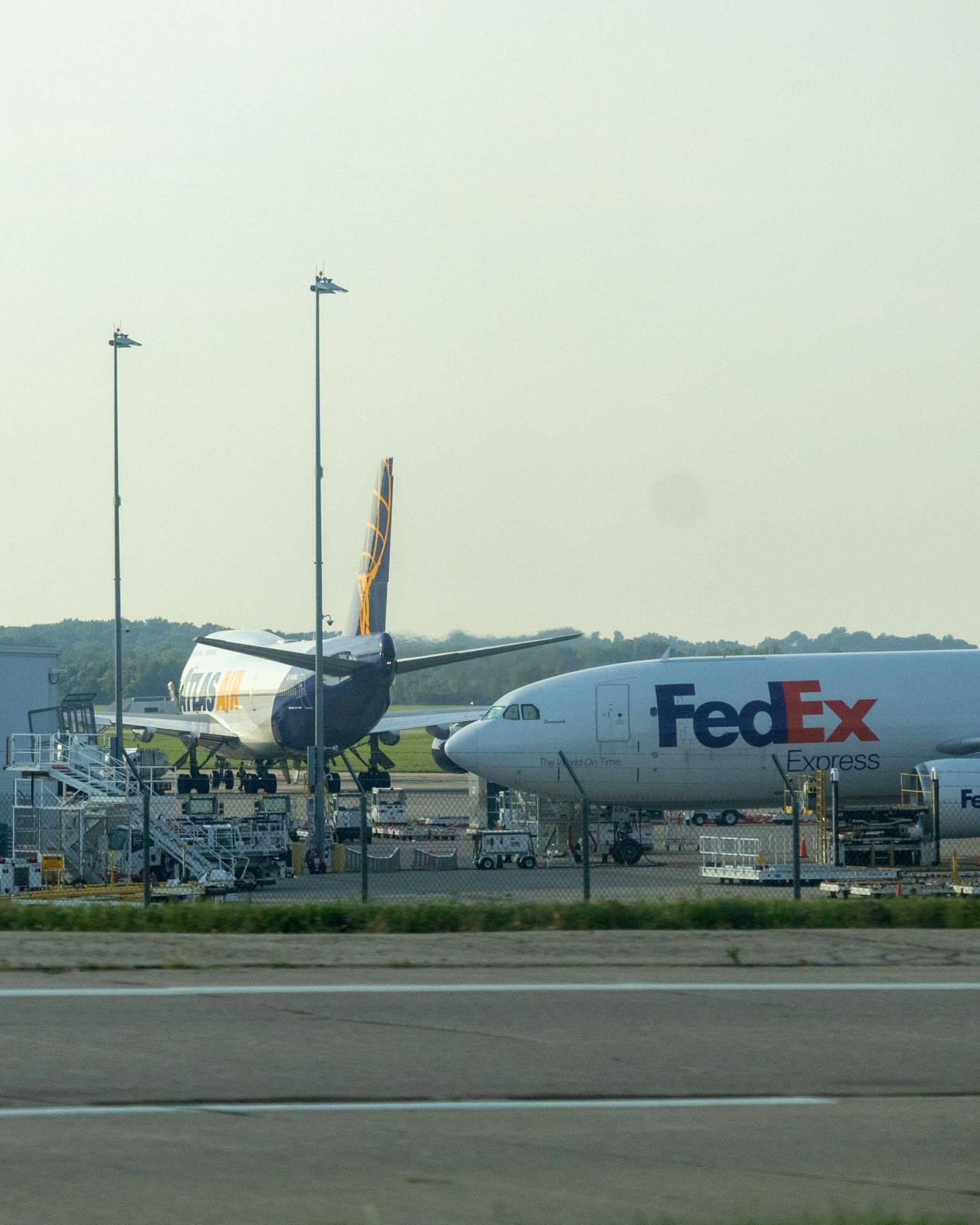 Cargo planes parked at an airport cargo apron