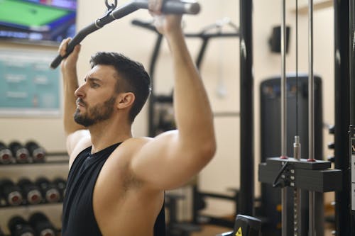 Free Man In Black Tank Top Working Out Stock Photo