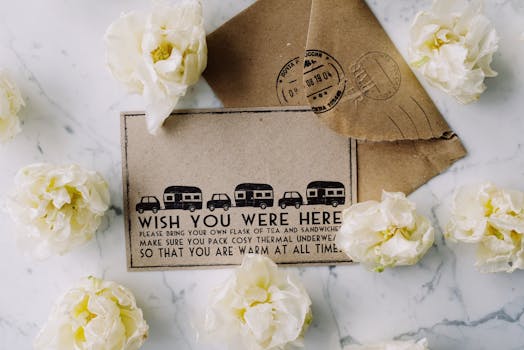 A vintage postcard with flowers on a marble surface, creating a nostalgic vibe.