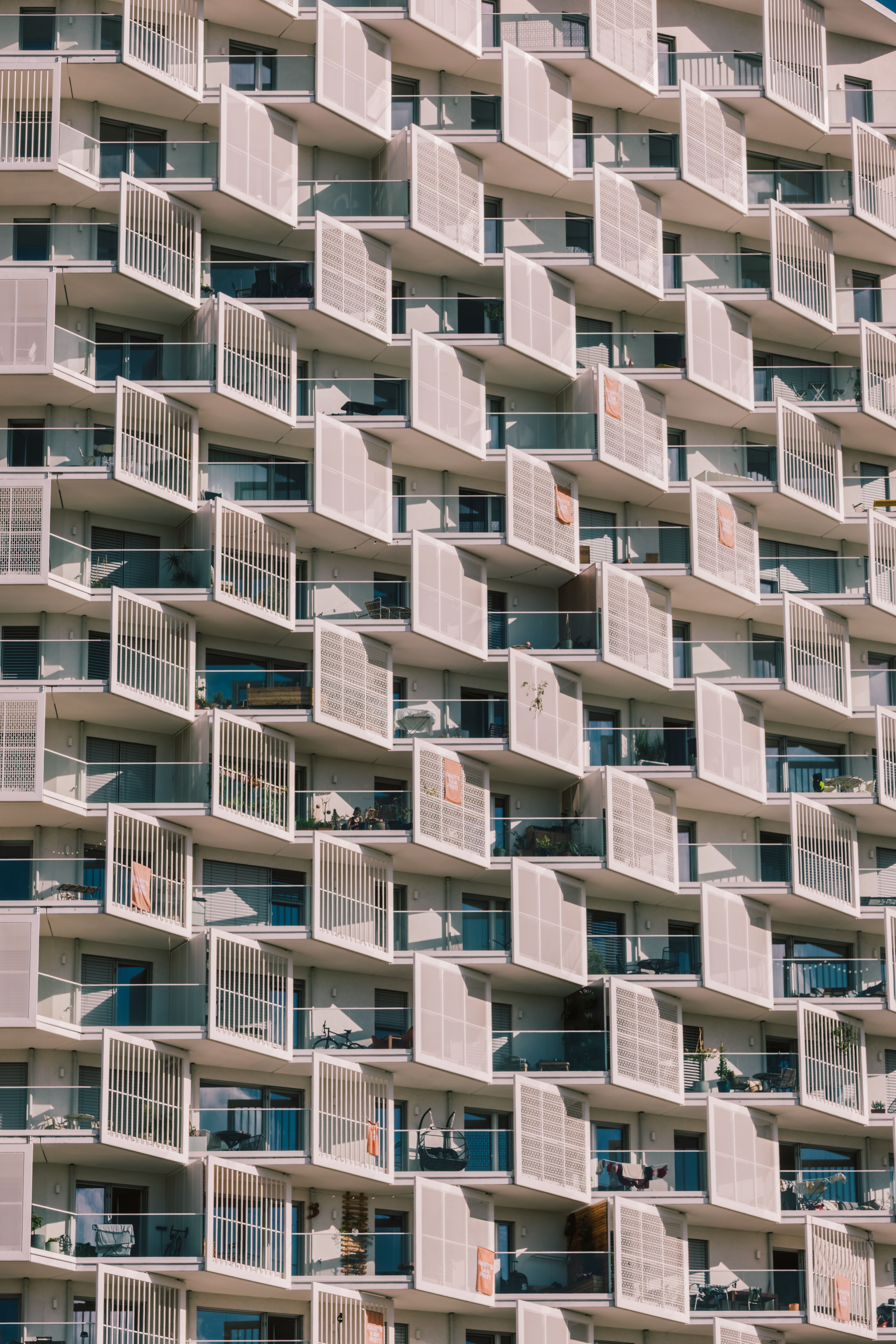 Close-up view of a modern apartment building facade with repetitive geometric design in Vienna.