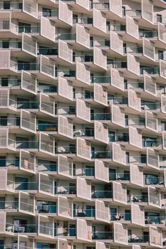Close-up view of a modern apartment building facade with repetitive geometric design in Vienna.