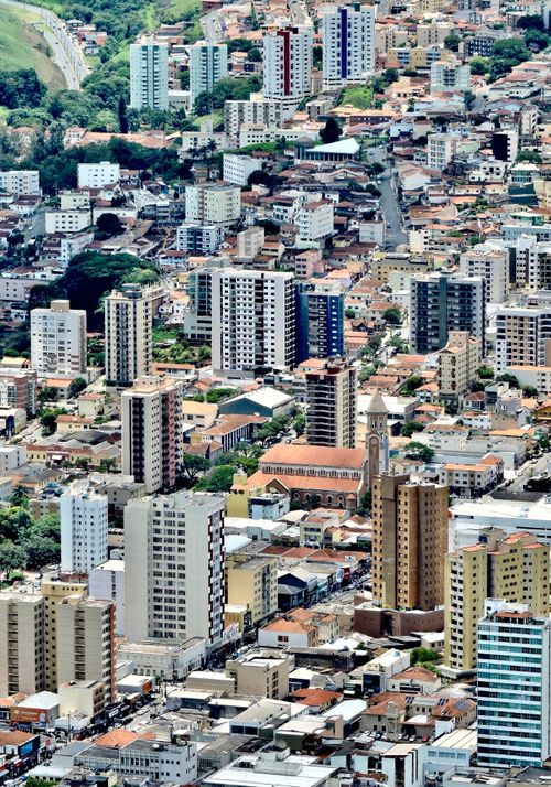 Free Aerial perspective showcasing the urban landscape of Poços de Caldas, Brazil. Stock Photo