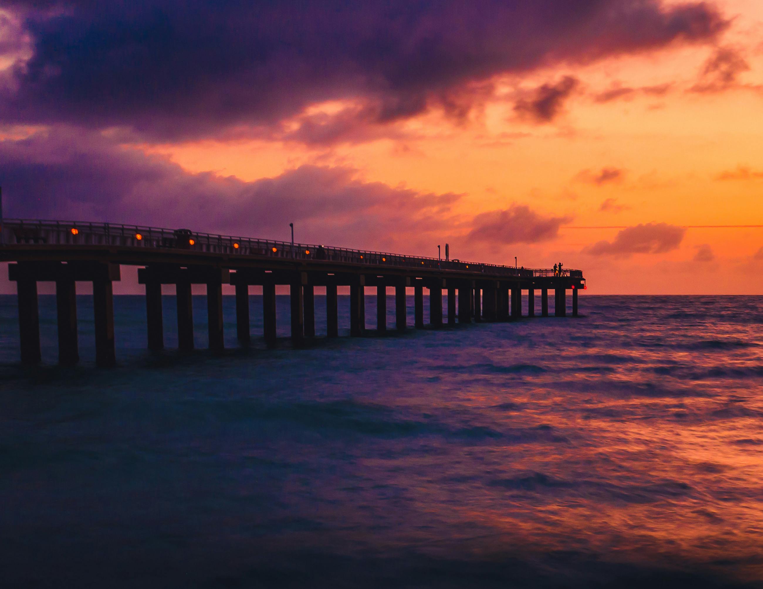 Silhouette Of Pier During Sunset · Free Stock Photo