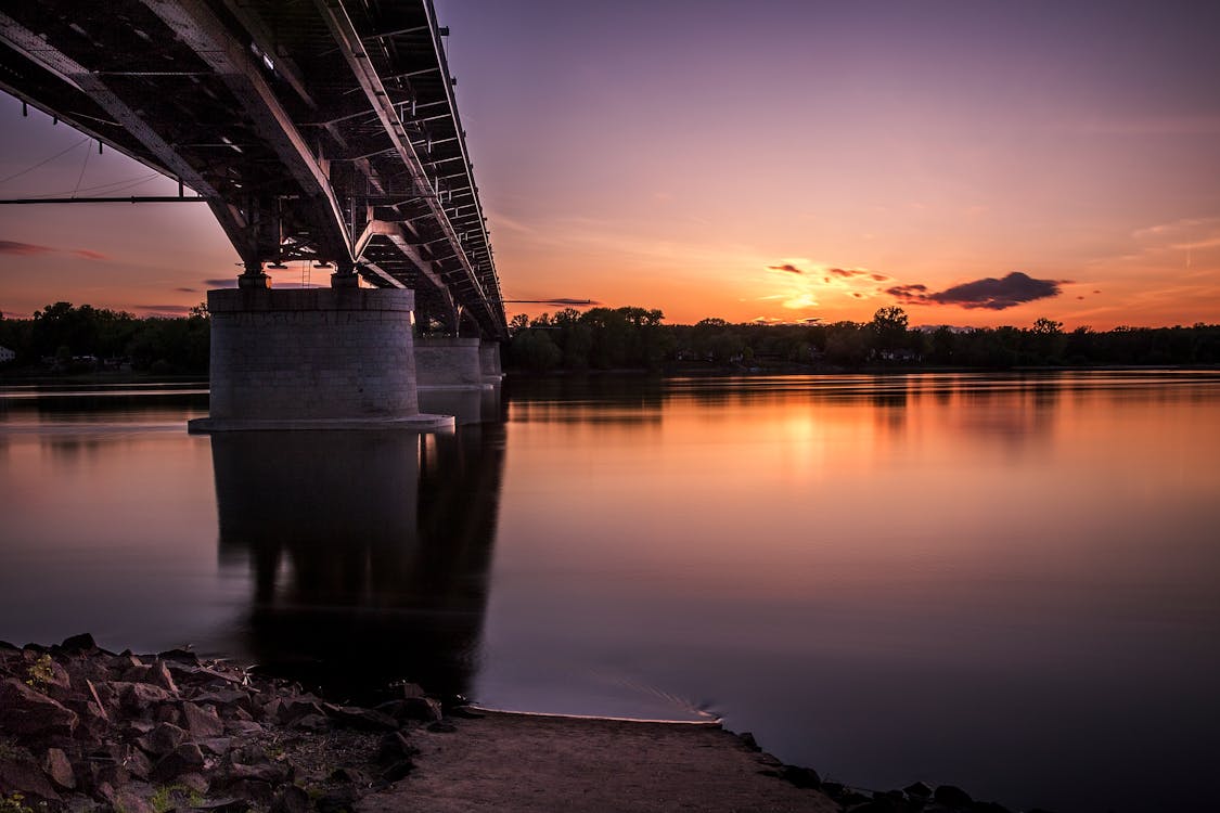 Gray Metal Bridge Above Body of Water