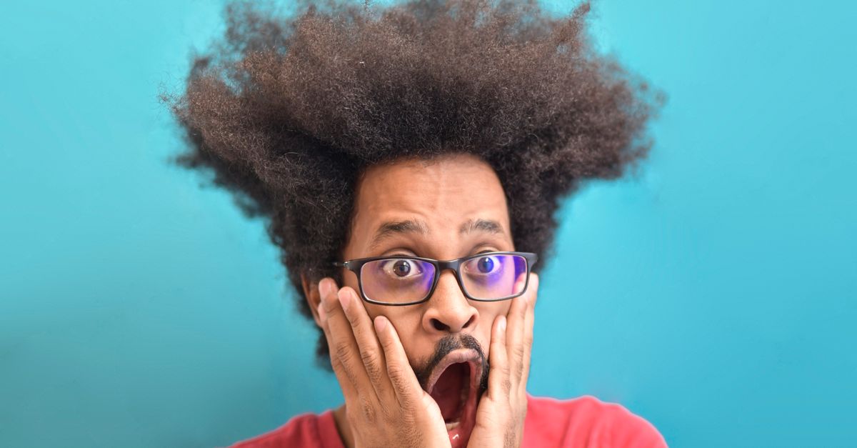 person looking shocked at a bank statement with red circles around fees