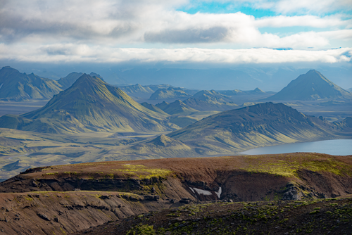 Free Stunning view of Iceland's rugged mountain range beneath a cloudy sky. Stock Photo