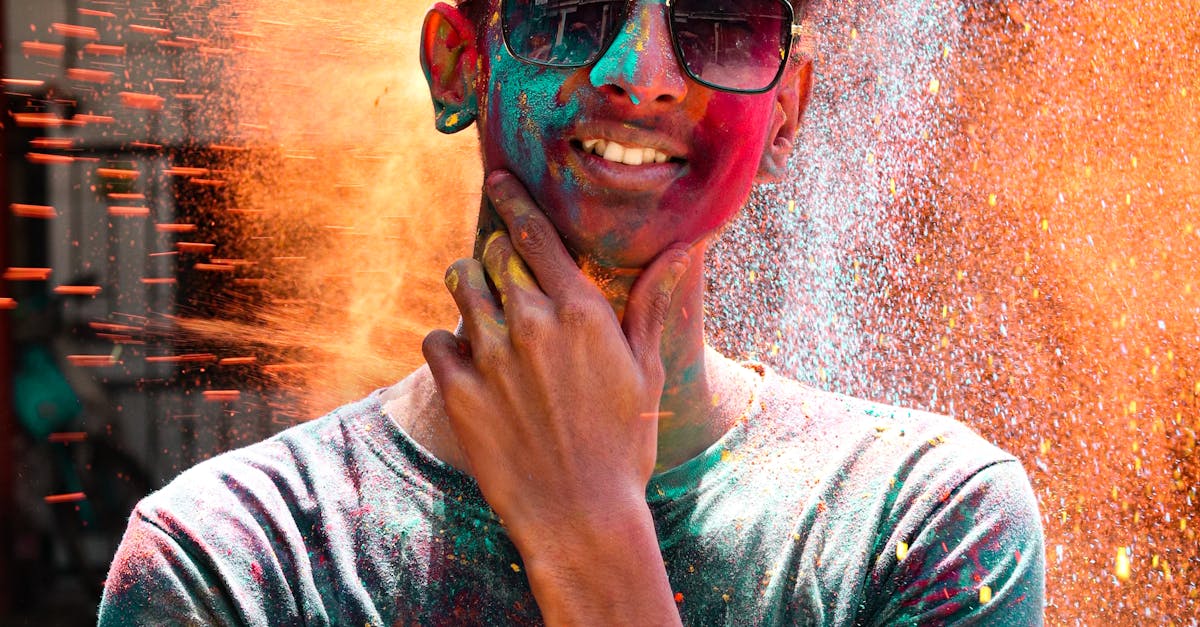 Man Covered In Colored Powder · Free Stock Photo