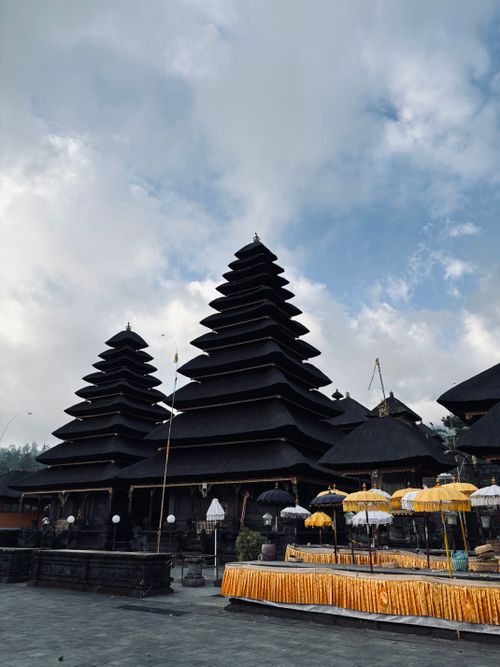 Free Explore the majestic architecture of a traditional Balinese temple under a bright sky, showcasing unique cultural heritage. Stock Photo