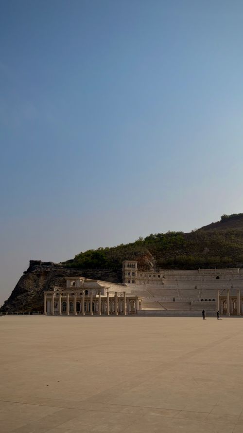 Free Beautiful outdoor amphitheater with dramatic architecture against a clear blue sky in Hatta, UAE. Stock Photo