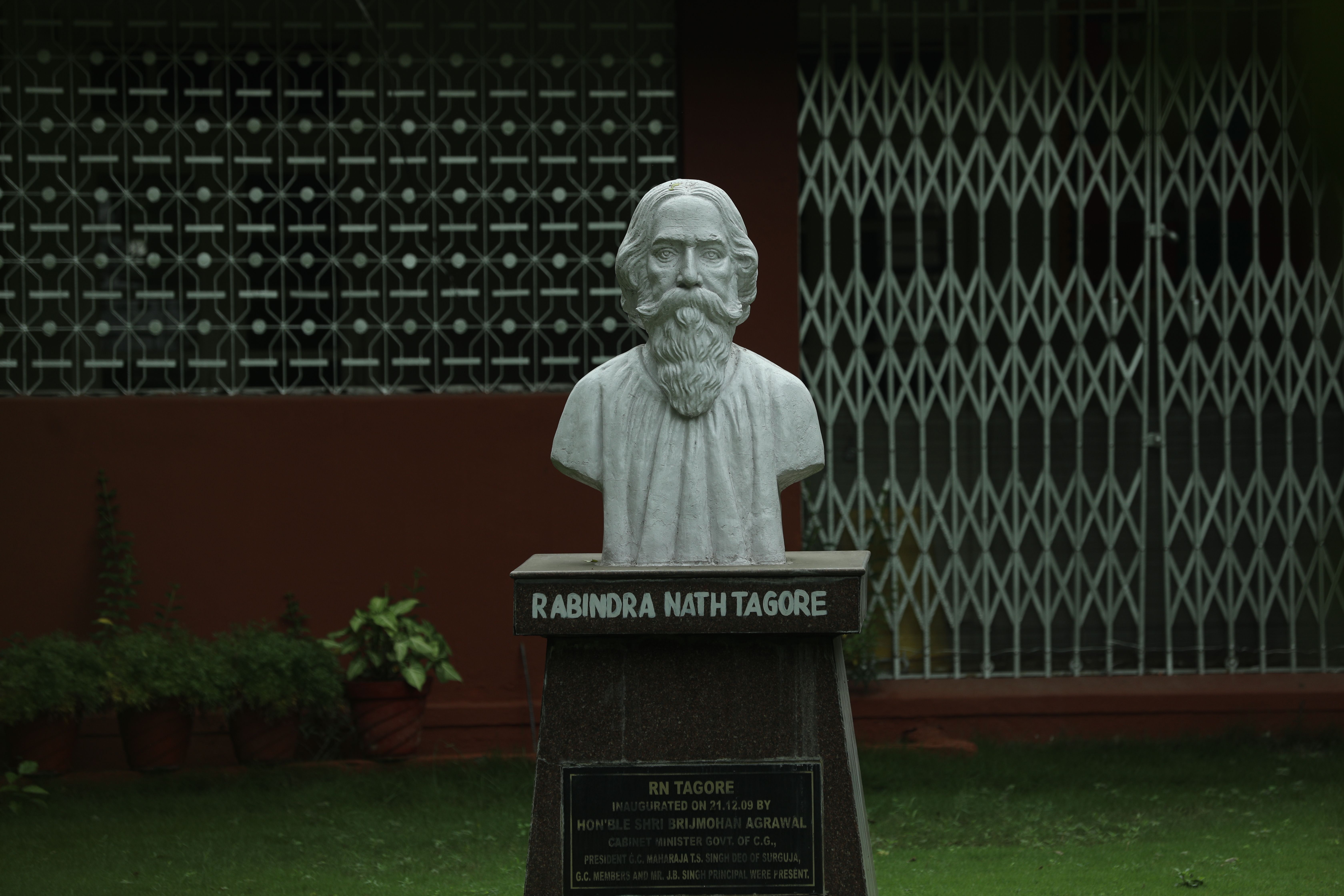 Marble bust of Rabindranath Tagore in a garden setting in Raipur, India.
