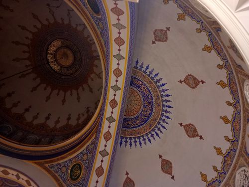Free Beautiful Islamic geometric patterns in ornate ceiling design, showcasing rich art and architecture. Stock Photo